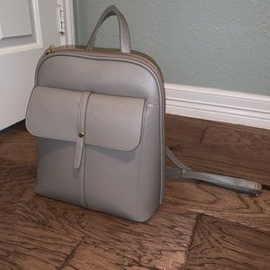 Grey leather backpack